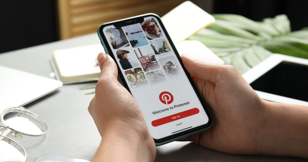 A woman staying compliant with Pinterest guidelines and FTC regulations